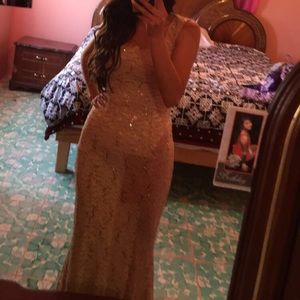 A cream/nude color long dress